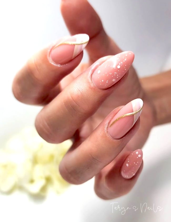 Nude gold nails with French manicure.