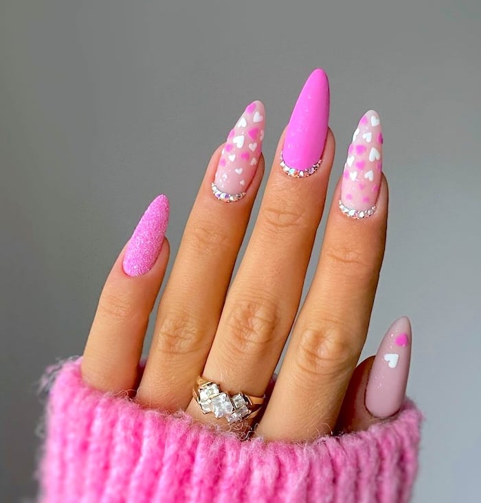 Pink and white heart nails.