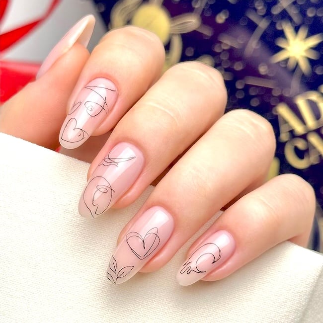 Nude nails with designs.