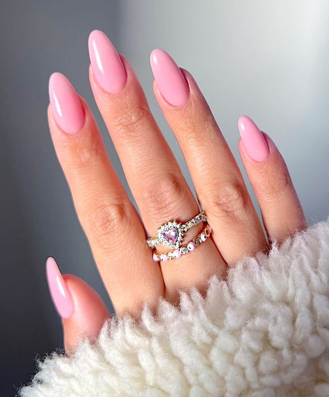 Pink almond nails.