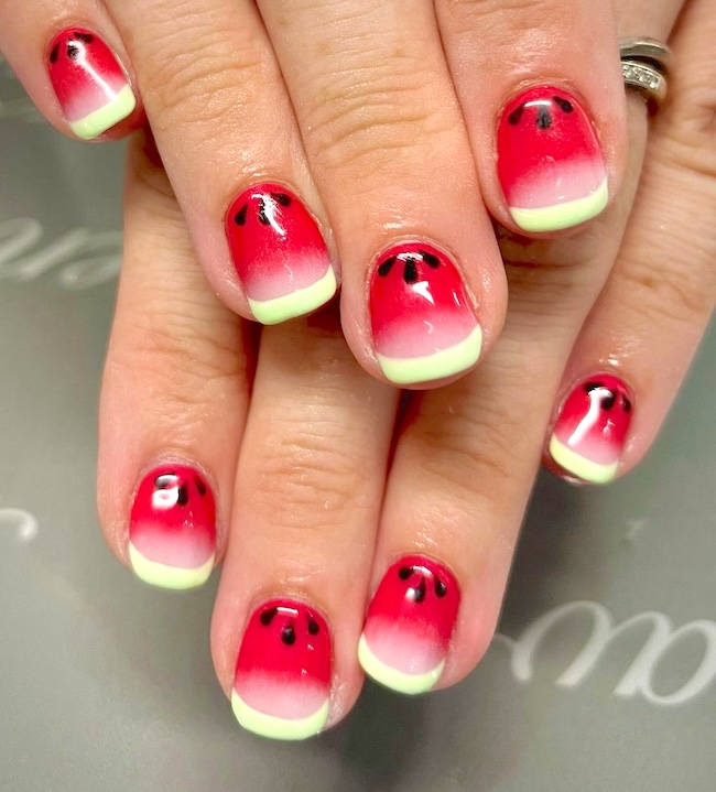 Watermelon French tip nails.