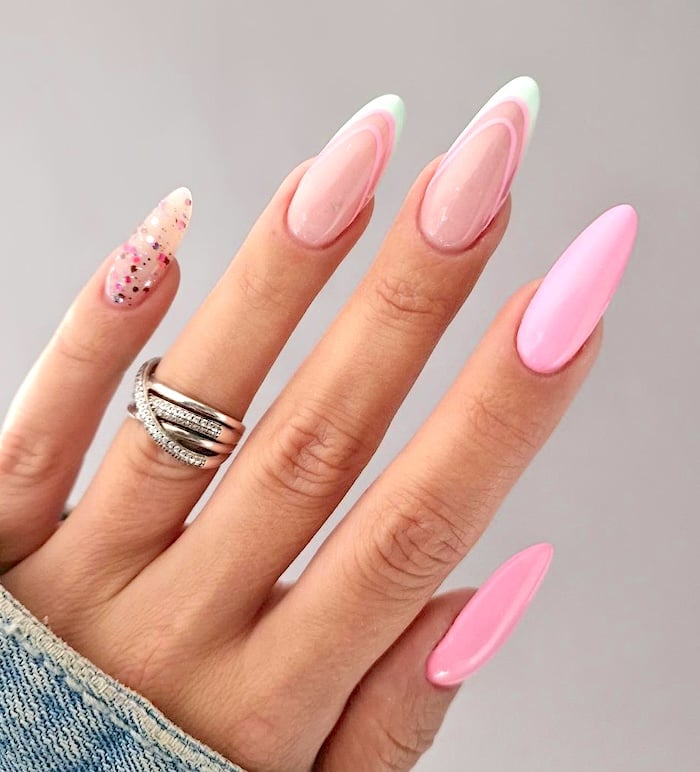 Pink and white French tip nails.