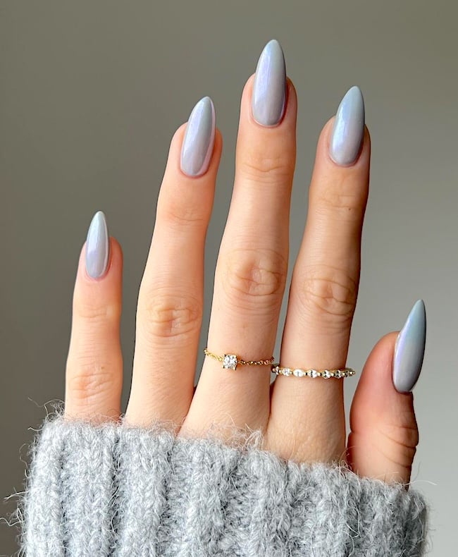 Pale blue chrome nails.