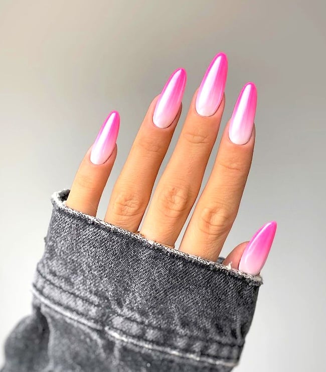 Pink and white ombre nails.