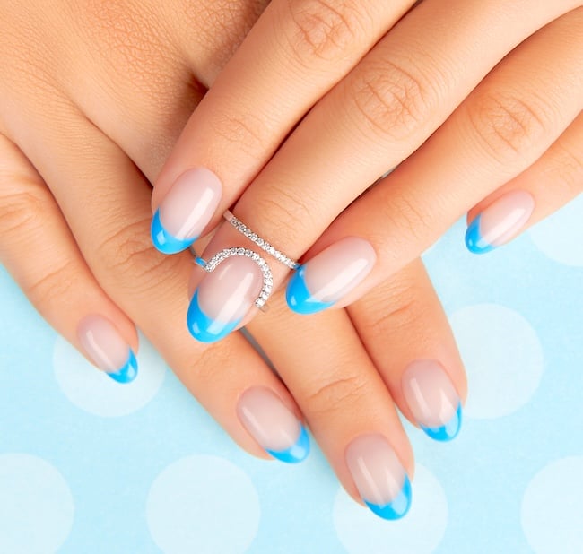 Bright blue French tip nails.