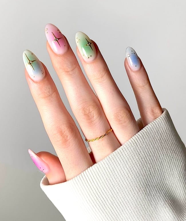 Pastel star almond nails.