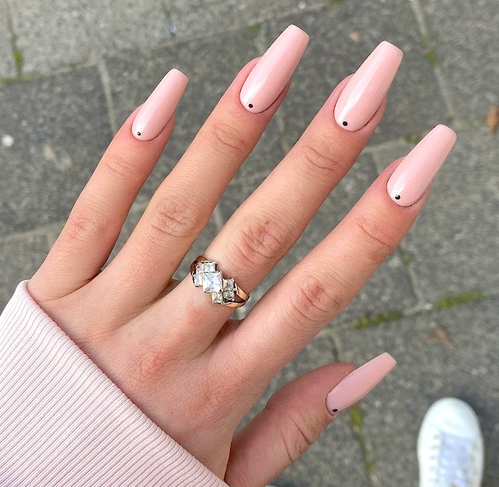 Pink dot minimalist nails.