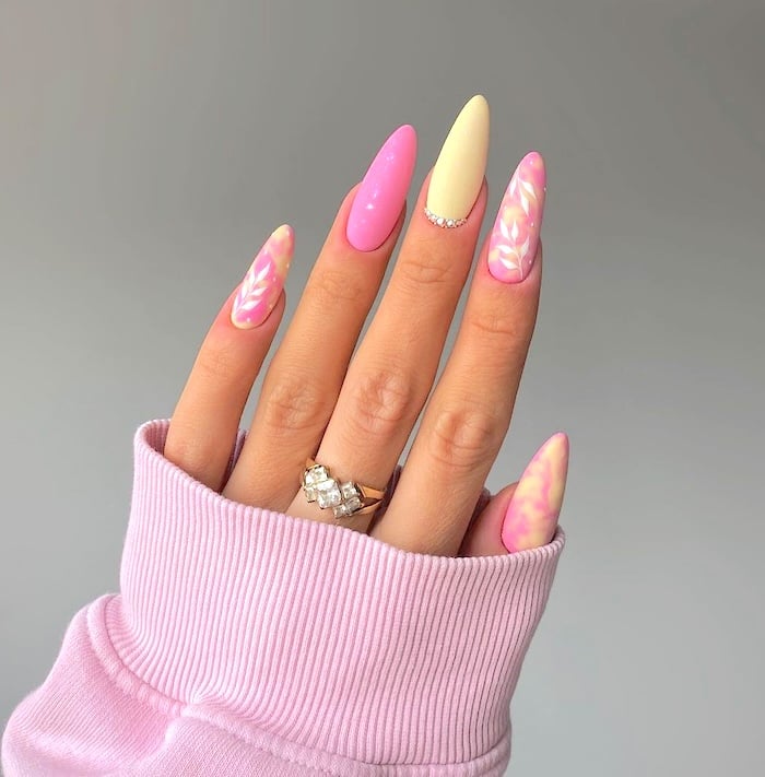 Pink and pastel yellow April nails.