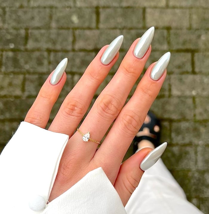 Silver chrome nails.