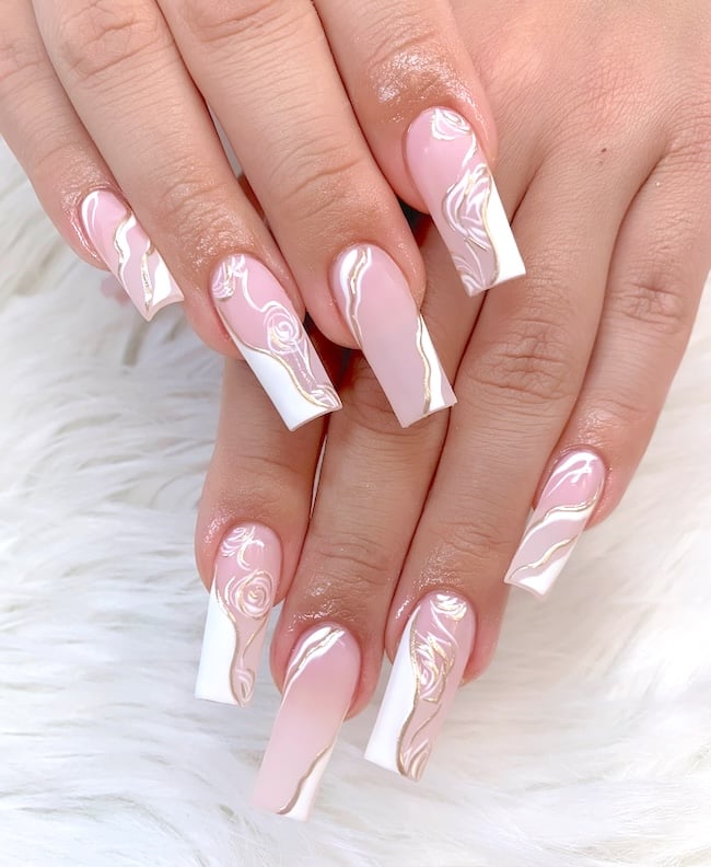 Pink and white swirl coffin nails.