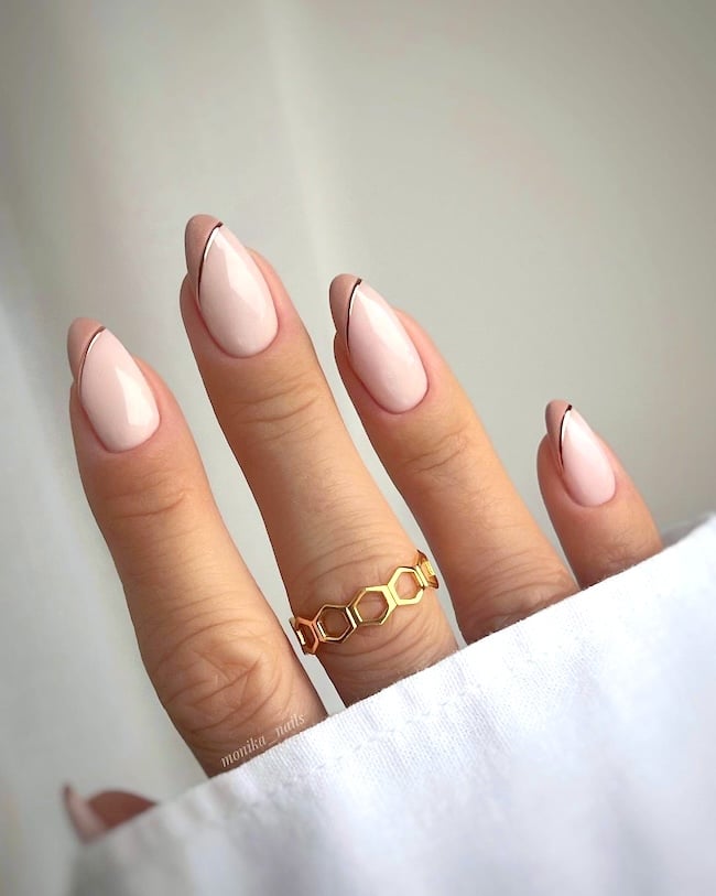 Beige nude nails.