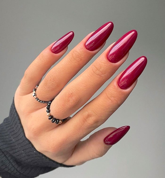 Deep berry red nails.