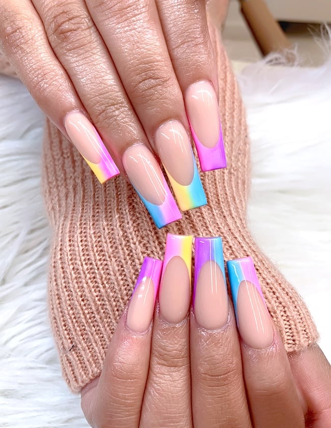 Colorful French tip coffin nails for May.