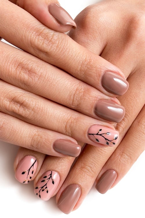 Nude nails with branches.