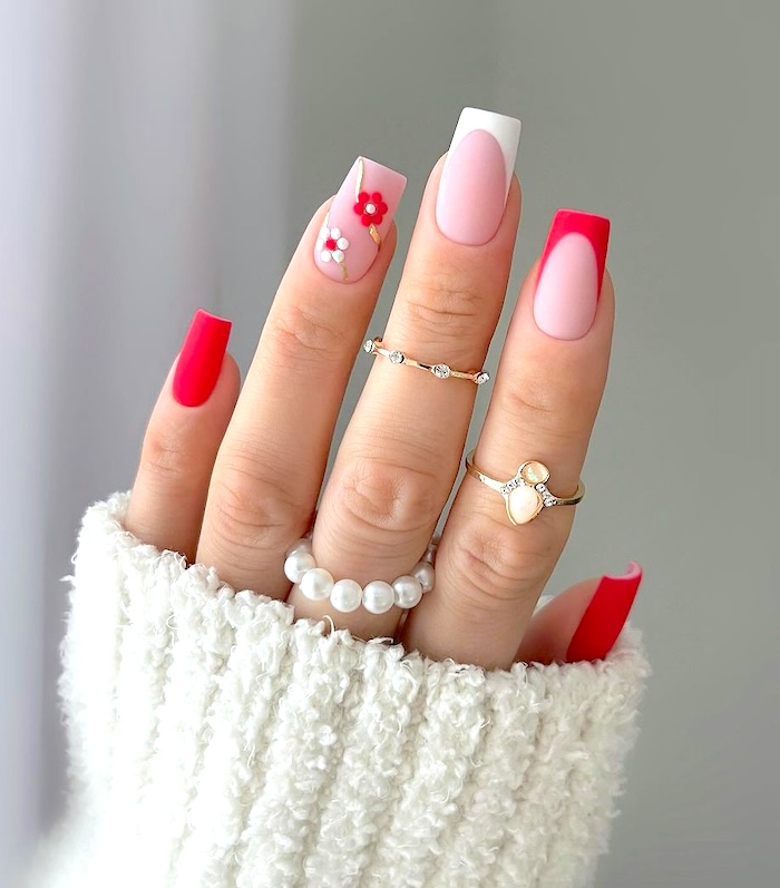 Red flower may nails.