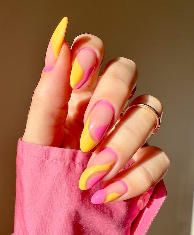 Yellow and pink April nails.