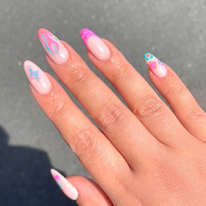 Mix and match pink April nails.