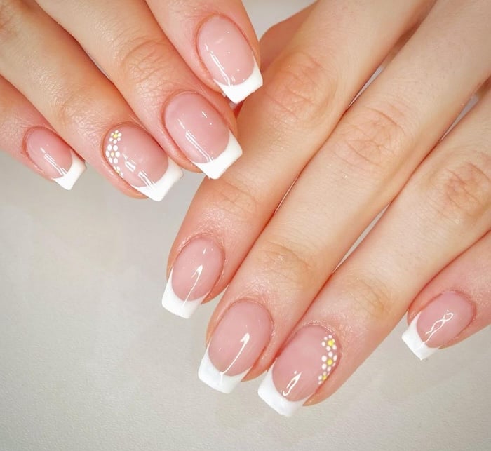 Flower French tip nails.