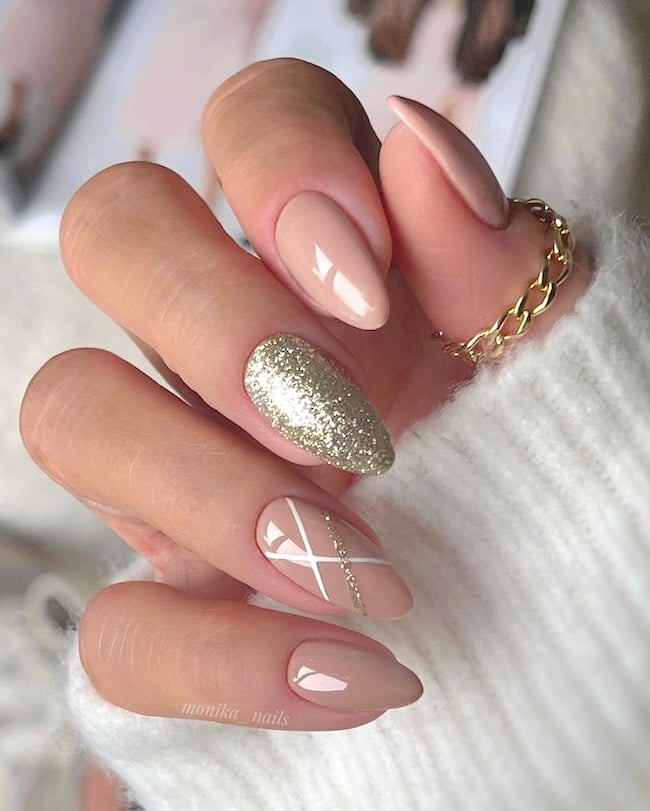 Nude sparkle nails.