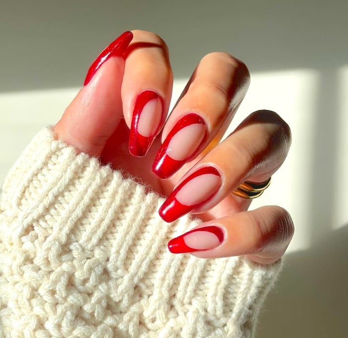 Red French tip nails.