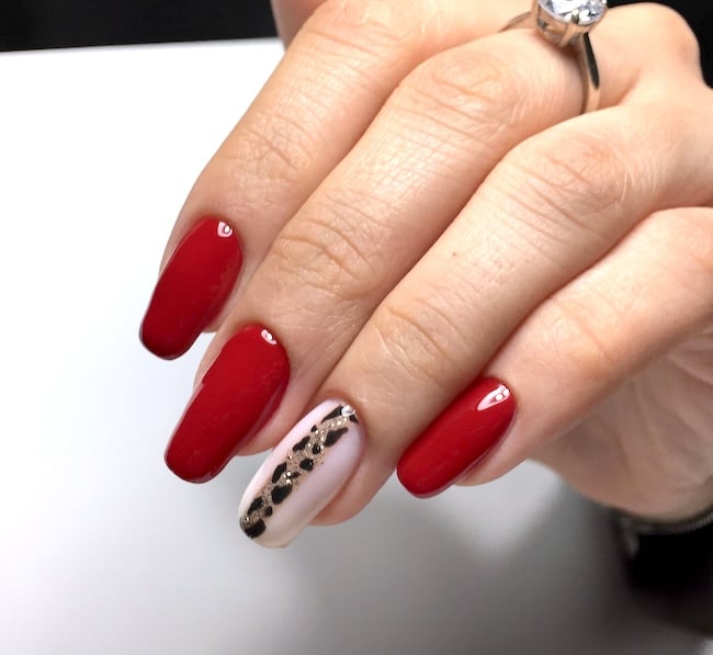 Red leopard nails.