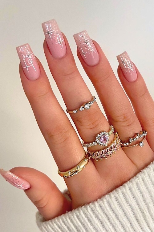 Pink sparkle glitter nails.