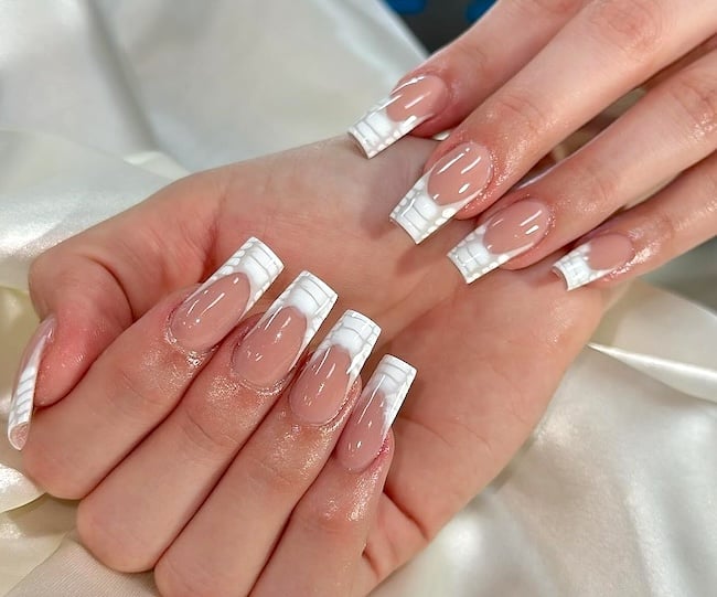 Crocodile French tip manicure.