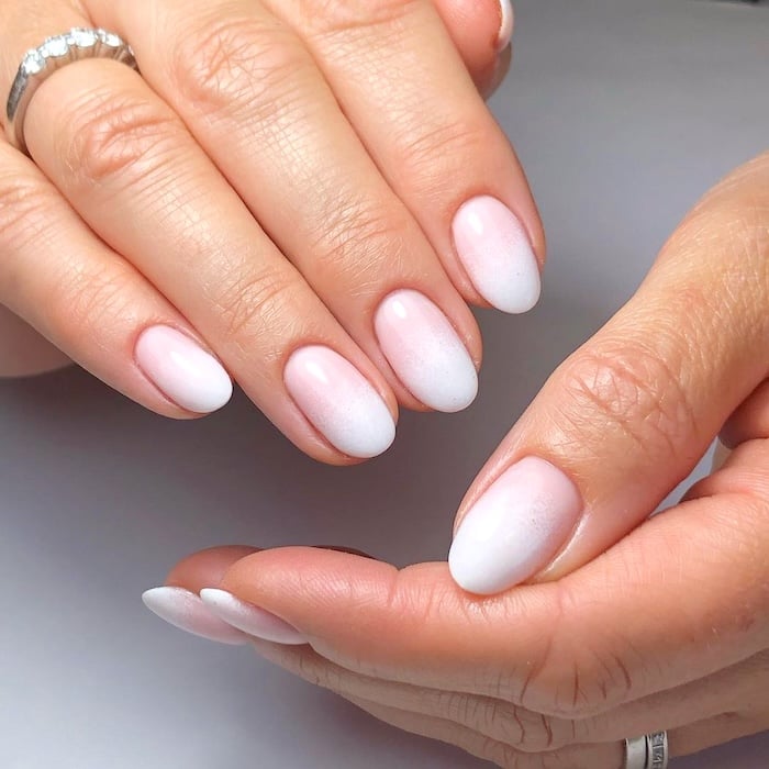 Ombre French tip Minimalist nails.