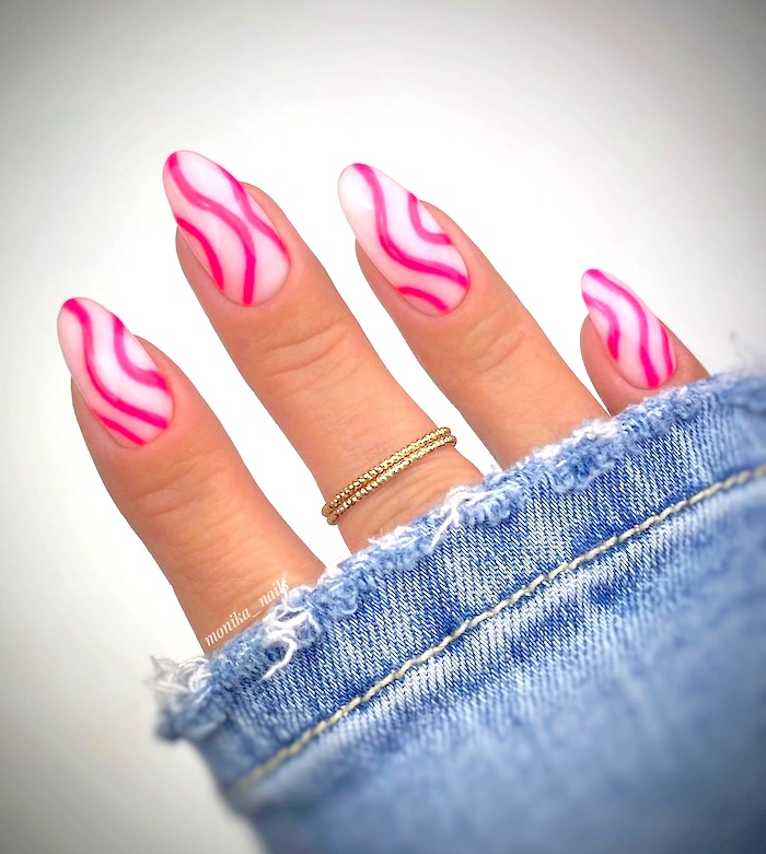 Pink swirl bright summer nails.