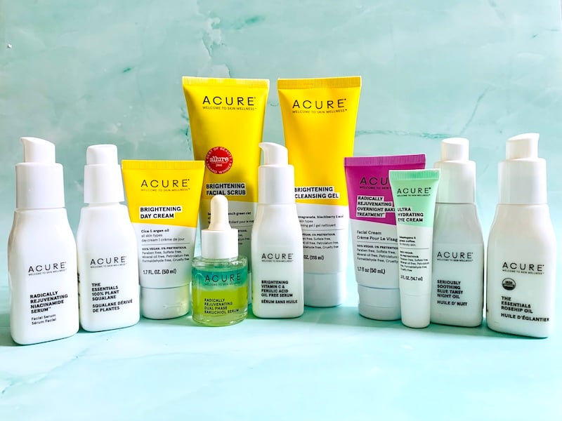 Acure Organics Skincare Review  - Products on a Green Background