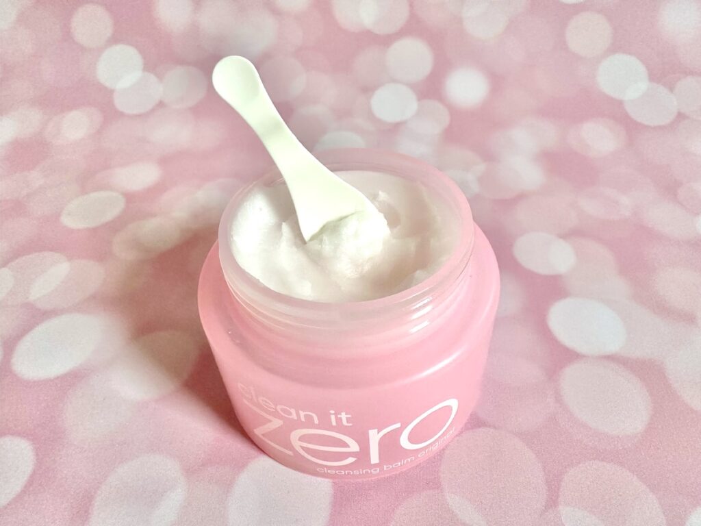 7. Banila Co. Clean It Zero Cleansing Balm, open jar with white cosmetic spatula.