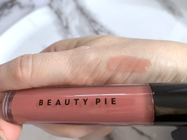 Beauty Pie Wondergloss Lip Oil Sampled on Hand