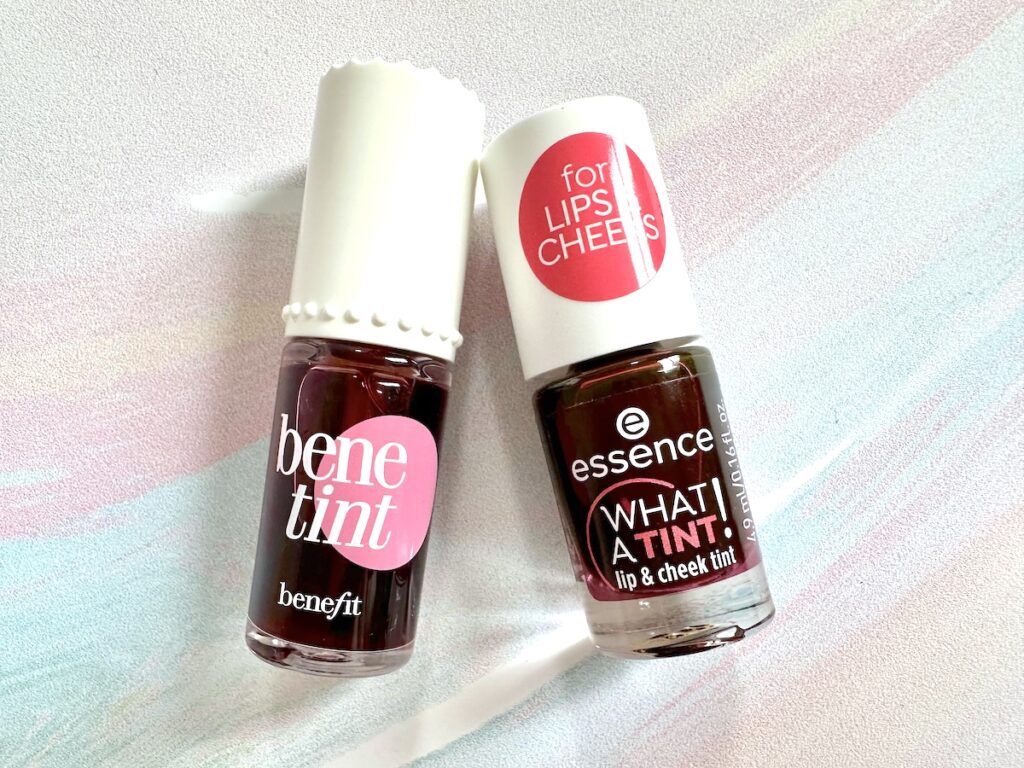 Benefit Benetint and Essence What A Tint! Lip & Cheek Tint in the shade Kiss From A Rose, flatlay.