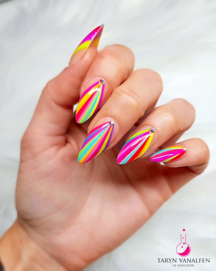 Bright colors and summer striped nails.