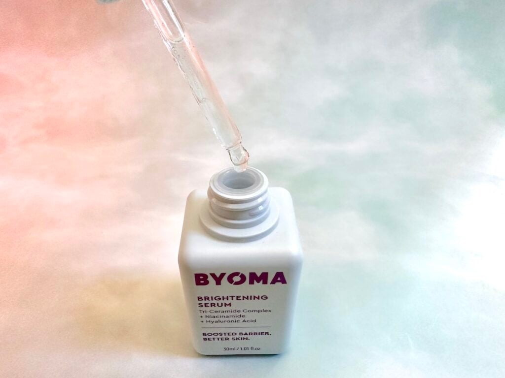 Byoma Brightening Serum open bottle with dropper.