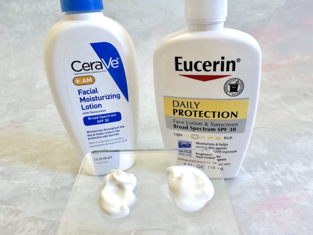 CeraVe AM Facial Moisturizing Lotion with Sunscreen and Eucerin Daily Protection Face Lotion Broad-Spectrum SPF 30, swatched on clear spatula.