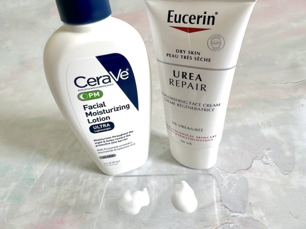 CeraVe PM Facial Moisturizing Lotion vs Eucerin Dry Skin Urea Repair bottles and samples on clear spatula.