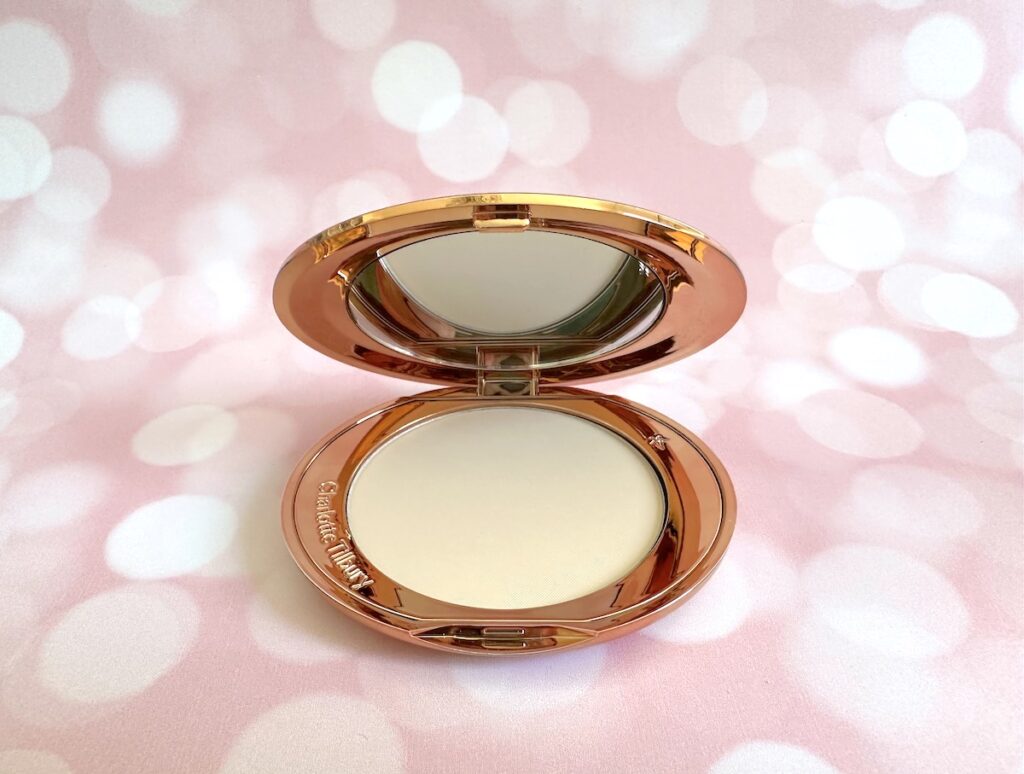 Charlotte Tilbury Airbrush Flawless Finish Setting Powder in the shade Fair, open compact.