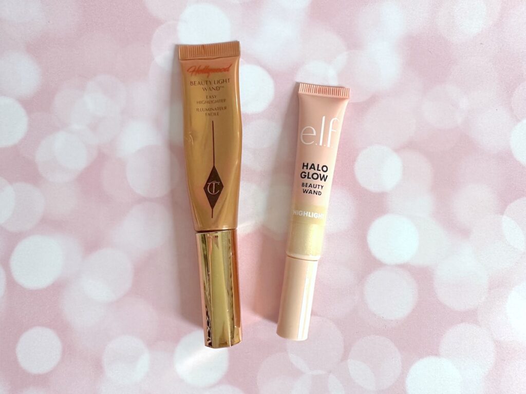 Charlotte Tilbury Hollywood Beauty Light Wand in the shade Spotlight and e.l.f. Halo Glow Highlight Beauty Wand in the shade Champagne Campaign, flatlay.