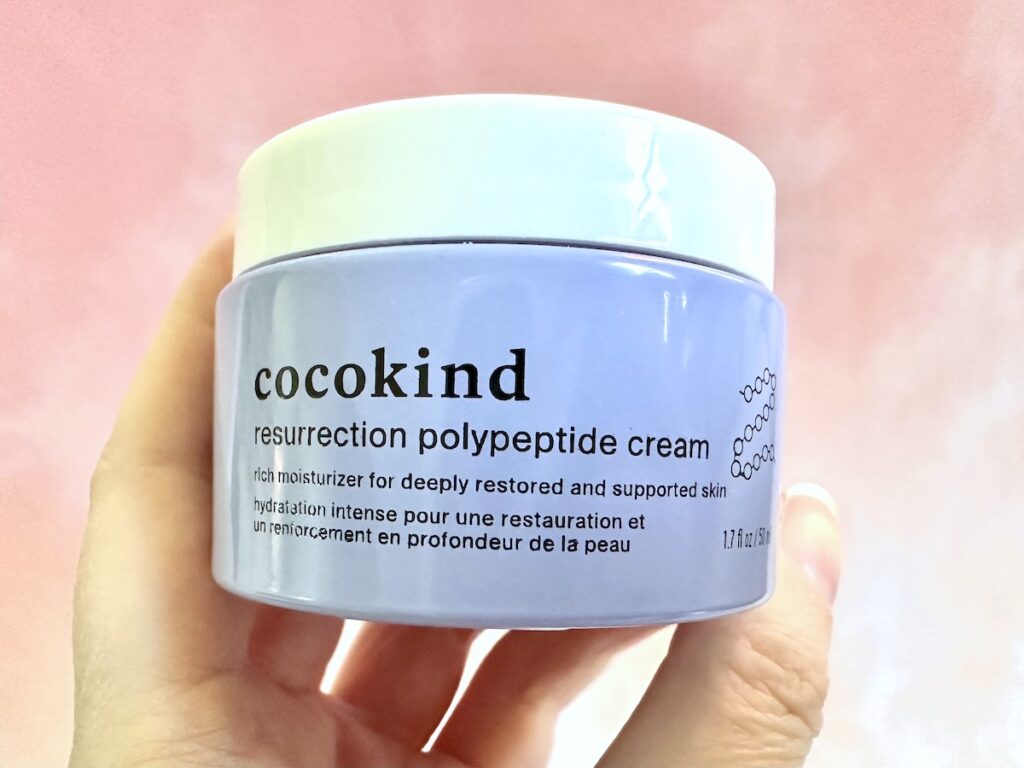 Cocokind Resurrection Polypeptide Cream, handheld.