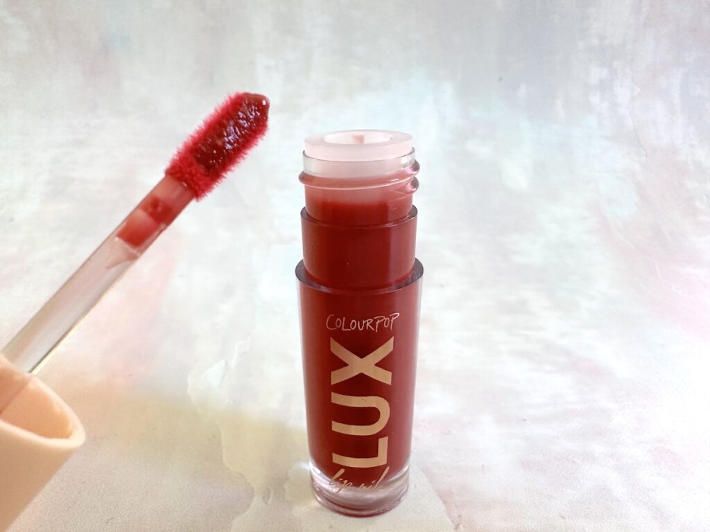 ColourPop Lux Lip Oil in the shade Bengal, open with dropper.