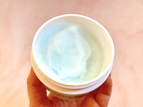 CoverGirl Clean Fresh Weightless Water Cream Moisturizer lid removed and blue product displayed