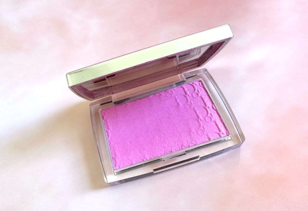 Dior Backstage Rosy Glow Blush in the shade Pink, open compact, flatlay.