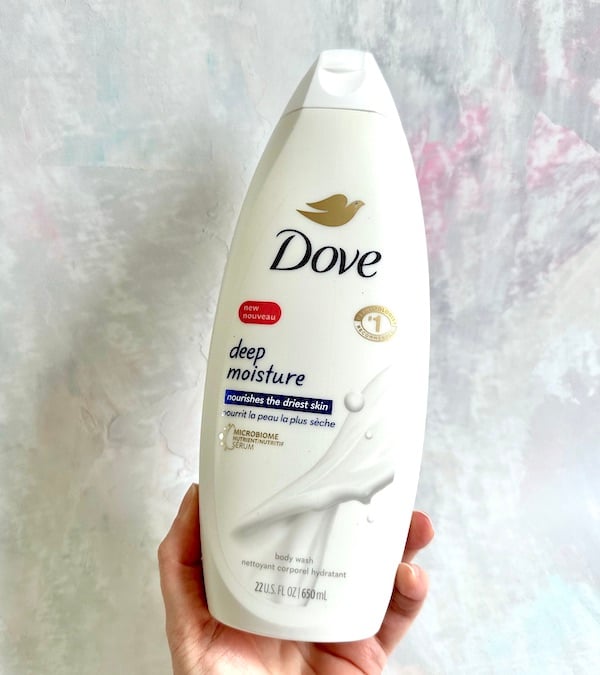 Dove Deep Moisture Body Wash, handheld.