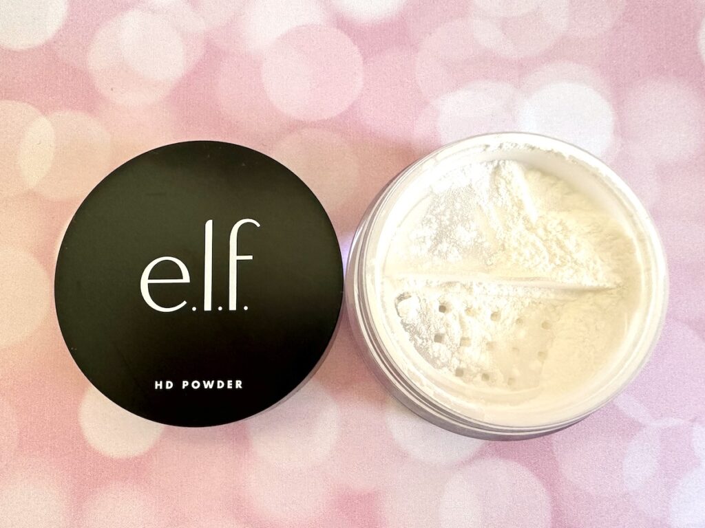 E.l.f. High Definition Powder in the shade Sheer, open jar flatlay.