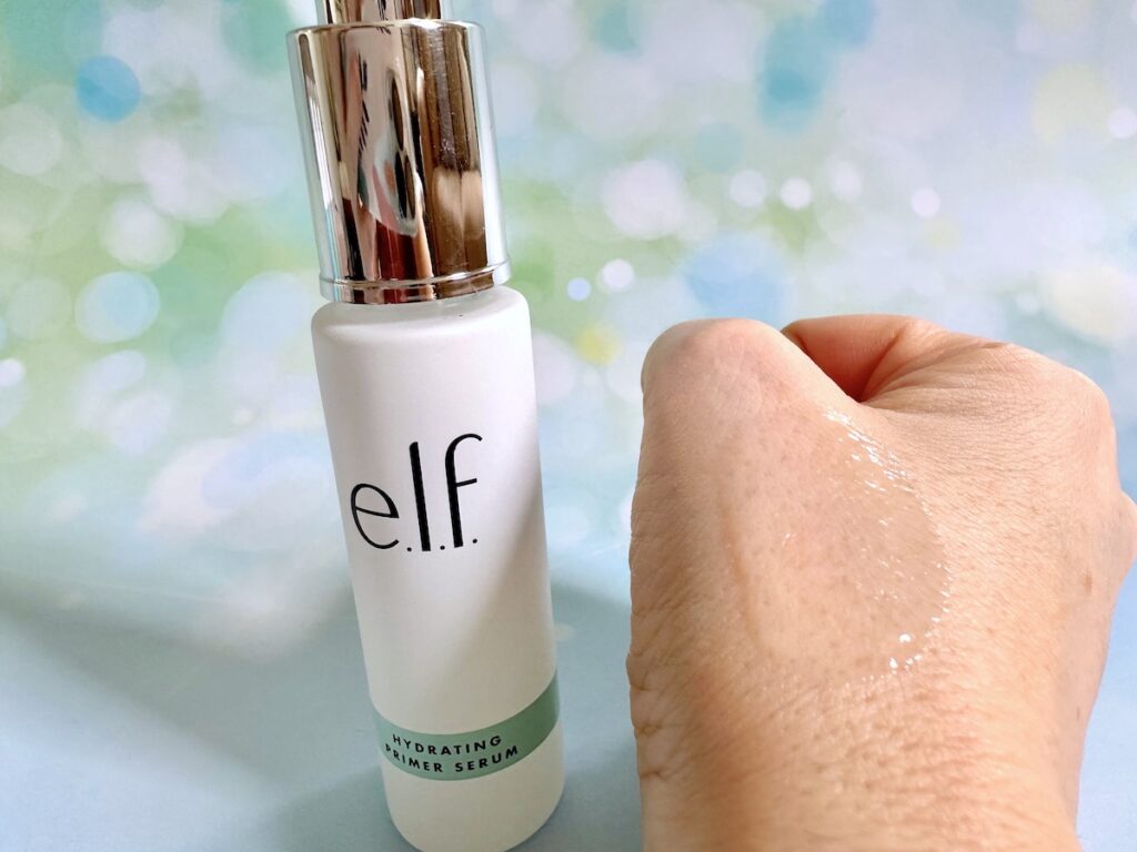 e.l.f. Hydrating Primer Serum bottle next to sample on hand.