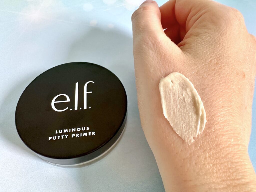 e.l.f. Luminous Putty Primer jar next to sample on hand.