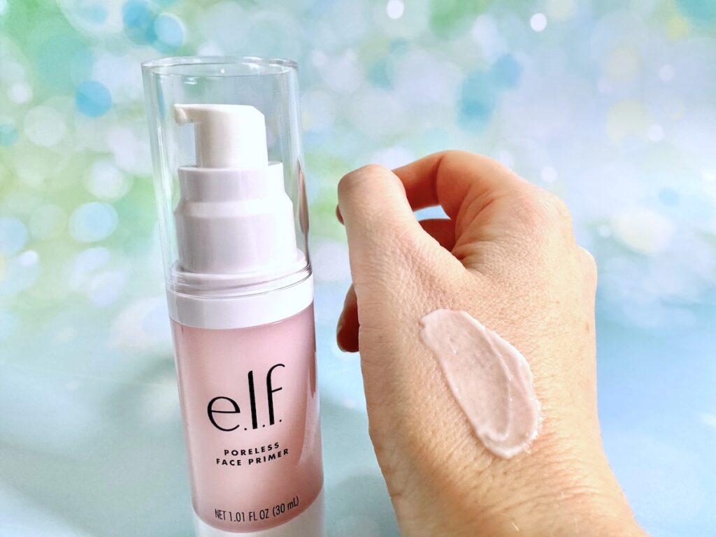 e.l.f. Poreless Face Primer bottle next to sample on hand.