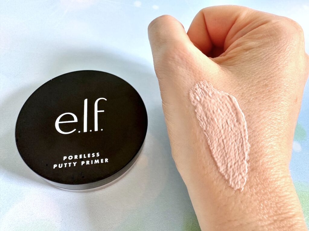 e.l.f. Poreless Putty Primer jar next to sample on hand.