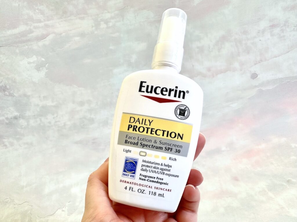 Eucerin Daily Protection Face Lotion Broad-Spectrum SPF 30, handheld.